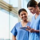 nurses discussing chart